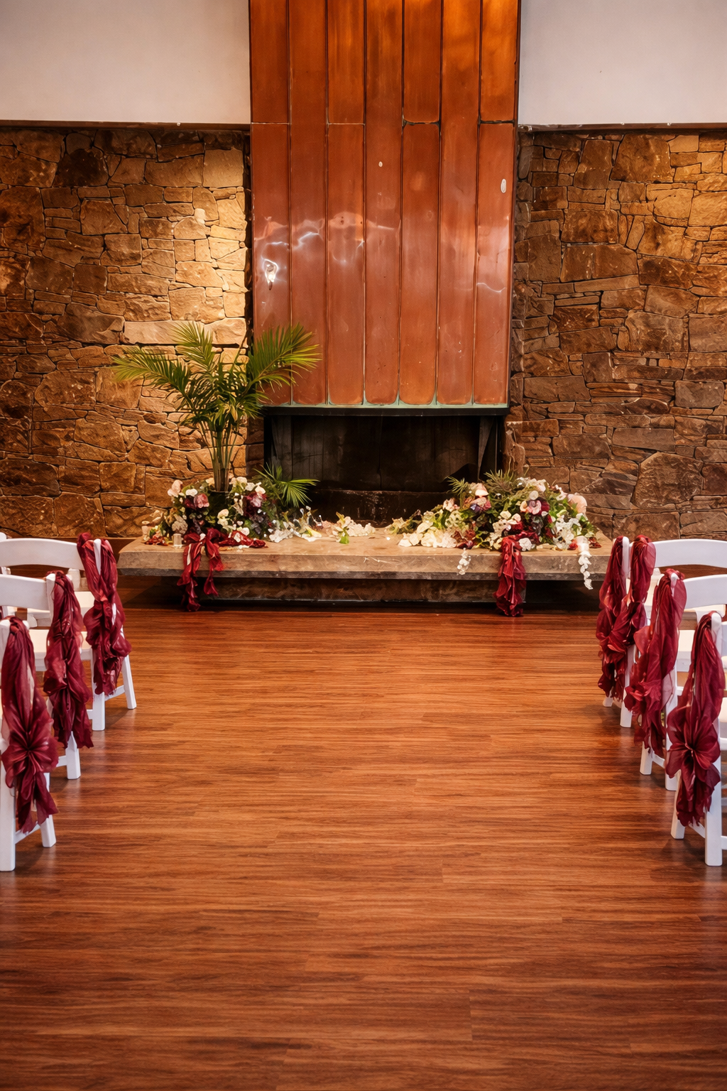 Both Rooms styled for a romantic wedding ceremony with a decorated fireplace and aisle seating